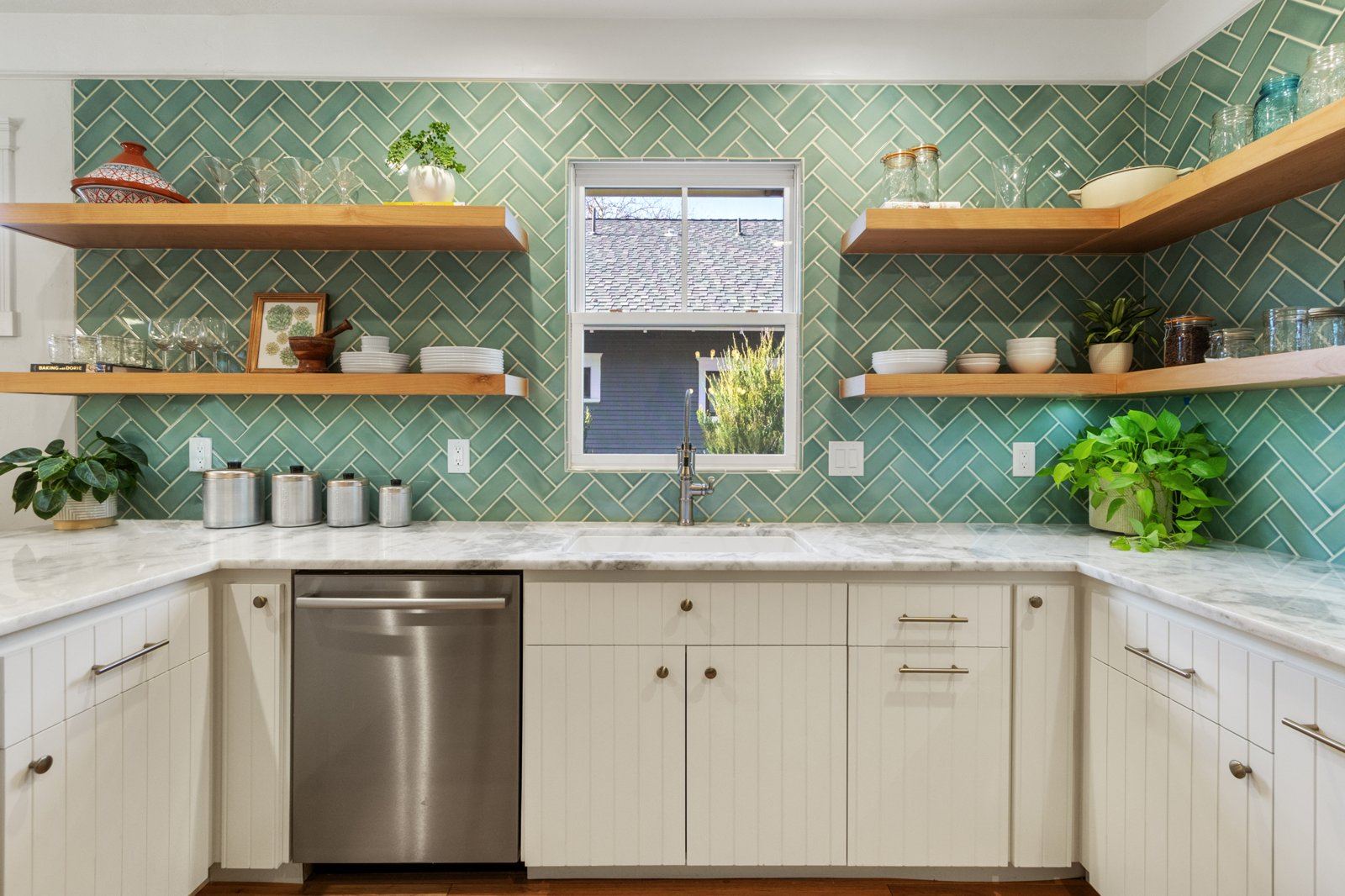 Green herringbone backsplash